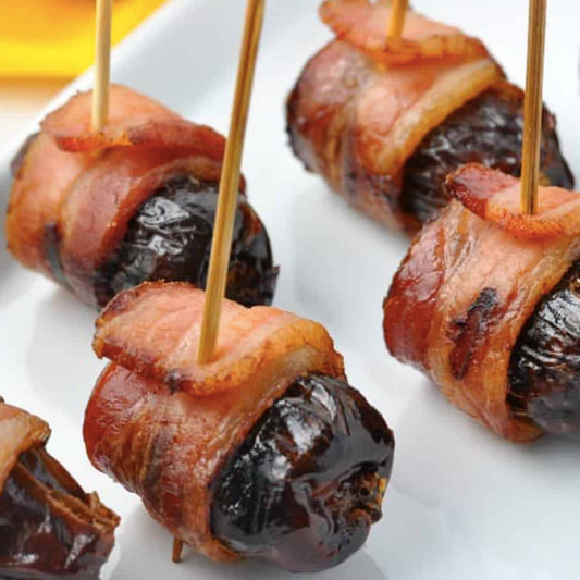 Dates wrapped in Benton's Bacon